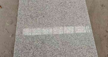 新疆芝麻白光面毛板